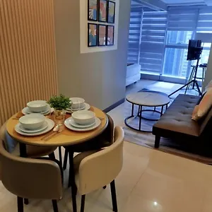Апарт-отель Uptown Parksuites Tower 1 Bgc